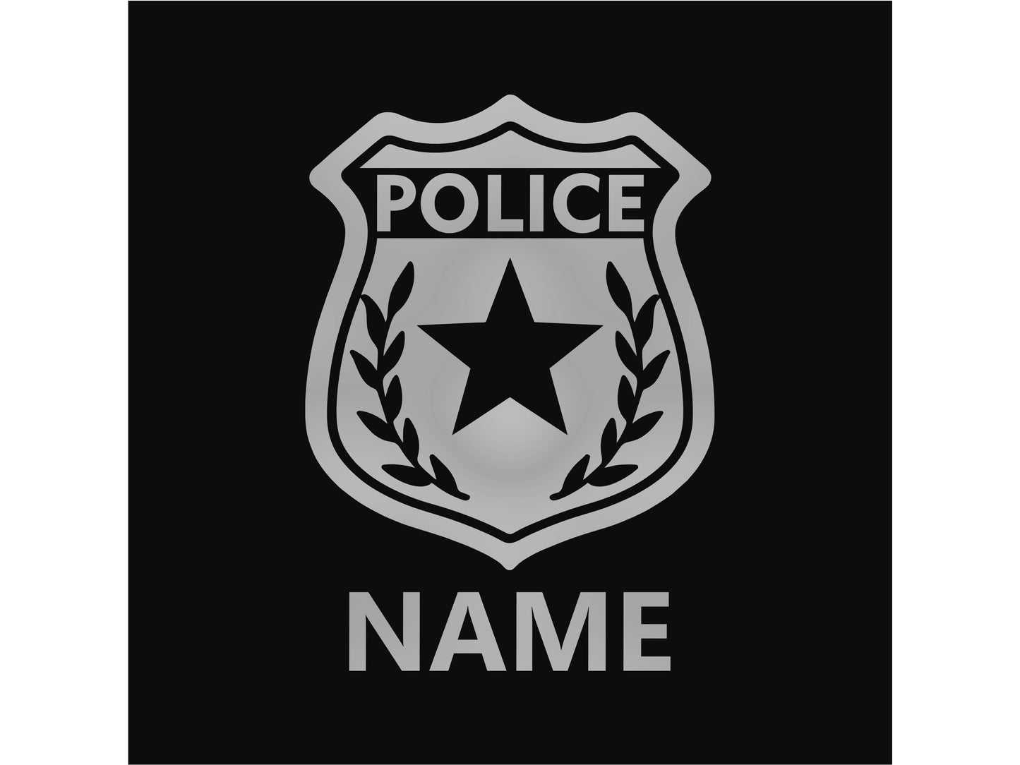 Close up of silver police badge with NAME in silver text underneath on a black background fabric.
