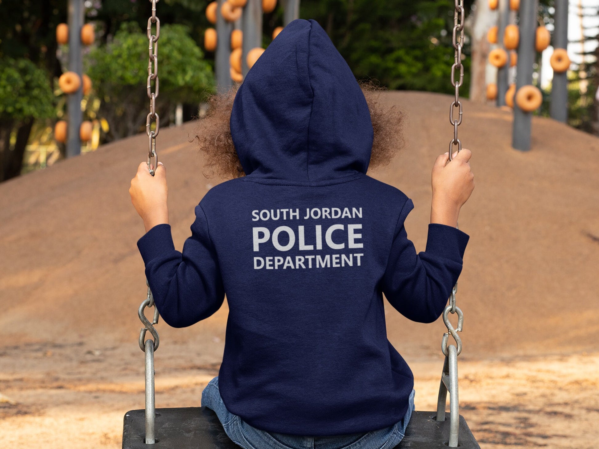 Back view of a navy blue hooded sweatshirt with the text &#39;SOUTH JORDAN POLICE DEPARTMENT&#39; printed on the back.
