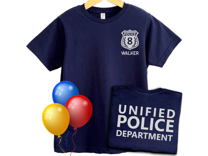Navy blue t-shirt with silver police badge on left chest with the number 8 and the name &#39;WALKER&#39; underneath in silver text. The shirt back has the text &#39;UNIFIED POLICE DEPARTMENT&#39; in silver text.