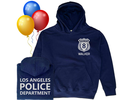 Navy blue youth hoodie featuring a silver police badge emblem on the front with the number placeholder for child&#39;s age, and the name  placeholder for Child&#39;s name, back displays Custom police department text in silver