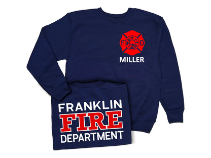 Navy blue crew neck sweatshirt with red Maltese cross on front left chest and the name &#39;Miller&#39; underneath in white. Shirt back has &#39;Franklin Fire Department&#39; in white and red text.