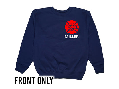 Front view of navy blue crew neck sweatshirt with Firefighter&#39;s red Maltese cross on front left chest and the name &#39;Miller&#39; underneath in white text.