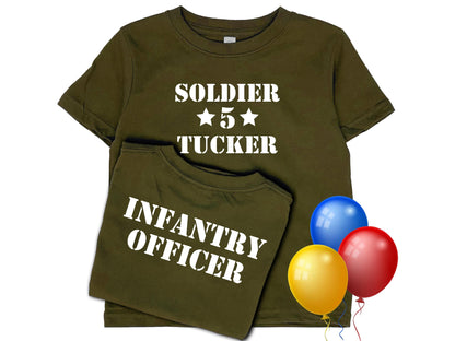 Army green short sleeve t-shirt with Soldier; in white text, 2 stars with the number 5, and under that the name &#39;Tucker&#39;. The shirt back reads &#39;Infantry Officer&#39; in white text. Three colorful balloons for a birthday theme.