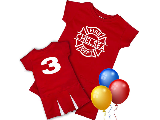 Personalized red firefighter birthday dress for girls, featuring a Maltese Cross with the name &quot;Chelsea&quot; on the front and the number &quot;3&quot; on the back. The dress has a playful fringe-style hem and is shown with colorful red, yellow, and blue balloons. Made to order for a fire-themed birthday party or special occasion.