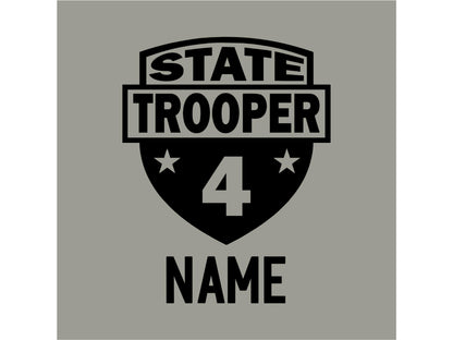 Closeup view of badge graphic design with the text &#39;STATE TROOPER&#39; and the number &#39;4&#39; in a shield shape. The text &#39;NAME&#39; is below the shield in black text, on a gray background.