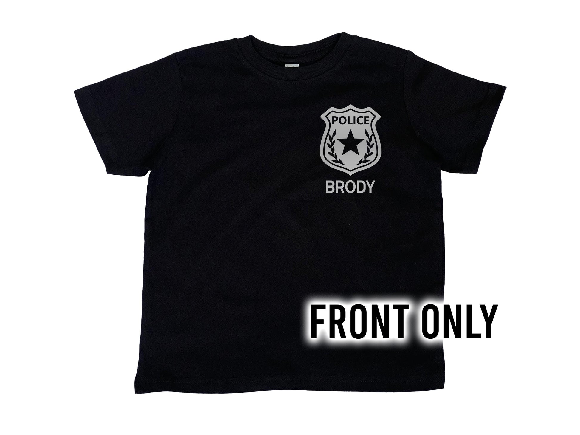 Front view of black t-shirt with silver police badge on left chest and the name &#39;Brody&#39; underneath in silver text.